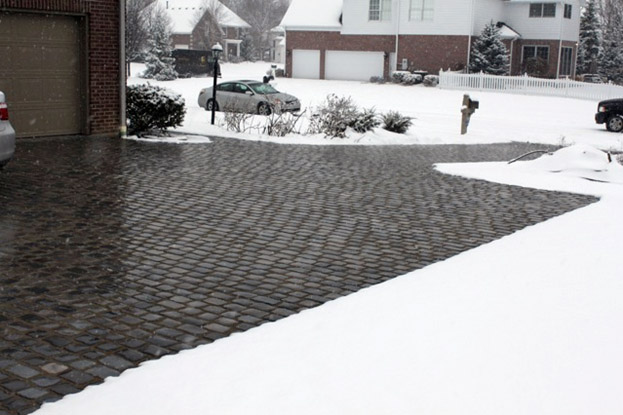 Heated paver driveway and parking area.