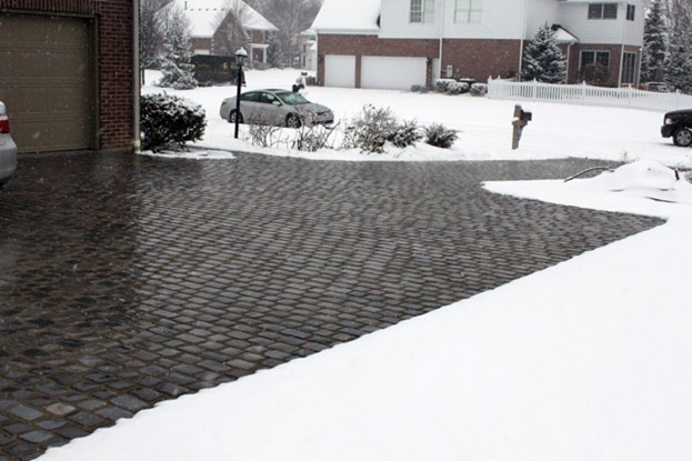 How to Melt Ice on a Driveway with an Outdoor Furnace