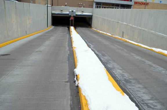 Snow melting system installed in ramp to parking structure.