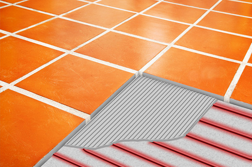 Radiant floor heating system showing tile and heat cable.