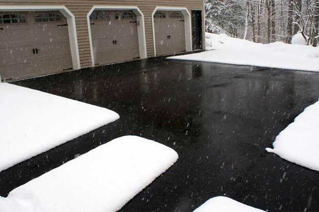 Heated driveway on an incline