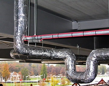 Pipe trace system installed at industrial facility.