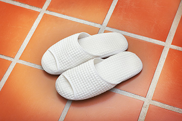 Heated tile floor and slippers.
