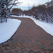 Custom snow melting system installed to heat large paver driveway