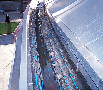 Gutter heat trace system installed in large commercial application.