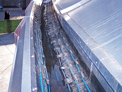 Heated commercial roof gutter.
