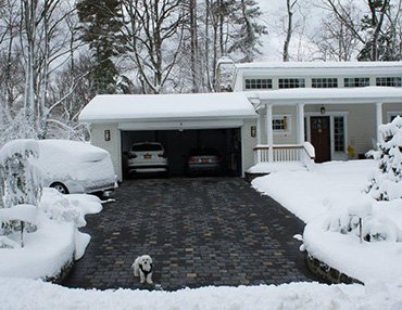 Heated driveway with brick pavers.