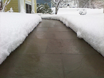 Heated pavers sidewalk after a heavy snowstorm.
